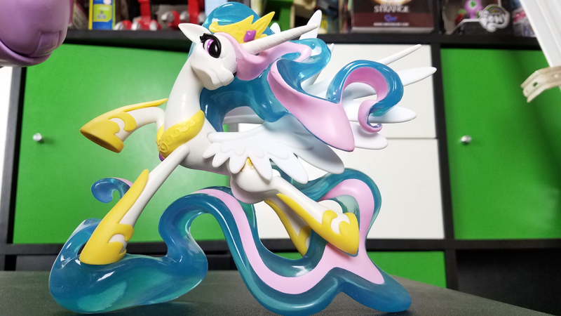 Princess Celestia’s wings move, and her hair fights cavities and keeps your breath minty fresh.